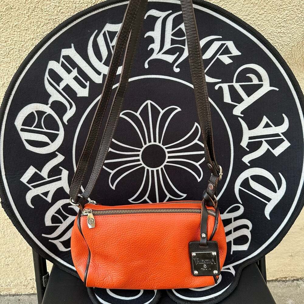 Valentina Pebbled Leather Crossbody Bag in Orange